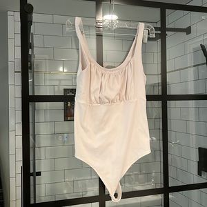 Abercrombie and Fitch soft white bodysuit.